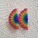 Rainbow-colored woven broche