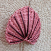 Handwoven sea shell 
