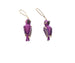 Two purple parrot-shaped bird charms