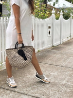 Iraca Palm Handwoven 'Luxe' Hand Basket with Tied Closures Ethically and Sustainably Sourced